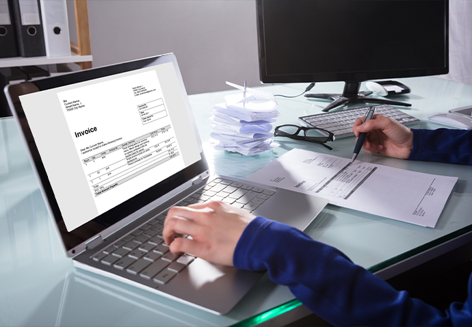 AP professional reviewing flagged invoice on payment error prevention software before submitting payment.